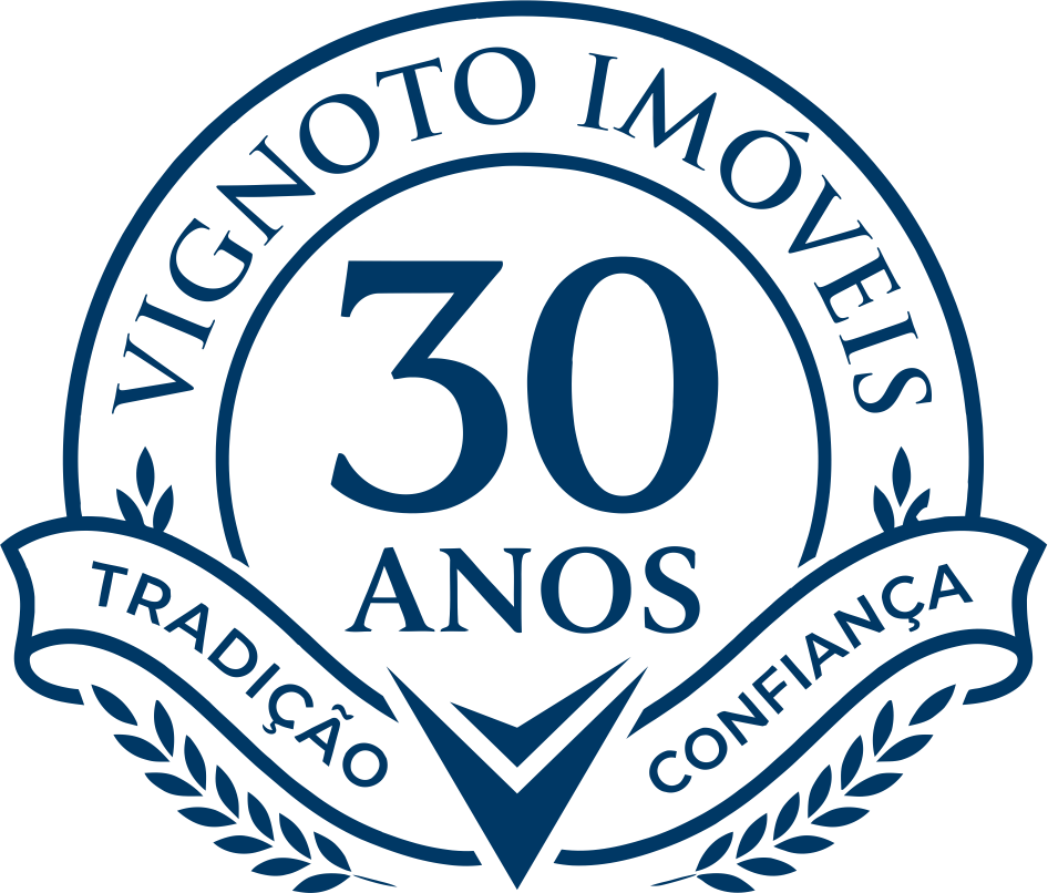 Selo de comemoração 30 anos de Vignoto Imóveis: tradição e confiança.